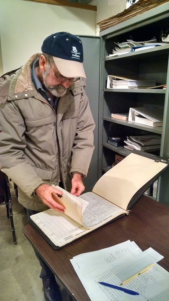 Charles Rodgers, Government Records Specialist, viewing records