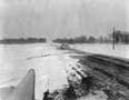 Blizzard conditions on road near Willmar, Kandiyohi County, March 17, 1965