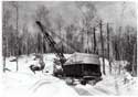 Prentice Grapple moving logs, Heikkinen Brothers Logging Operation at Forest Center near Ely, circa 1955