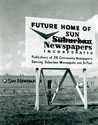 Billboard stating Future Home of Sun Newspapers