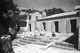 Unfinished patio, with worker and open doors; Jerome Hill's Cassis estate